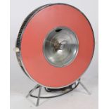 A circa 1960s Sofono 'flying saucer' electric convection heater in red colourway. Designed by