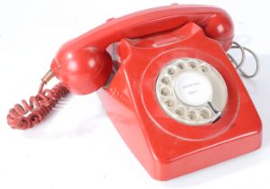 GPO 746 rotary telephone in red. "D 746F SPK 72/1" printed to the bottom.