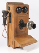 Kellogg wooden cased, wall mounted telephone, circa early 20th Century. With mouth piece to the left