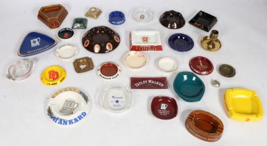 A large collection of pub/ tobacco advertising ashtrays of various sizes. Brands to include