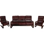 A mid 20th Century Scandinavian leather and bent wood three piece suite, comprising of a three