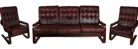 A mid 20th Century Scandinavian leather and bent wood three piece suite, comprising of a three