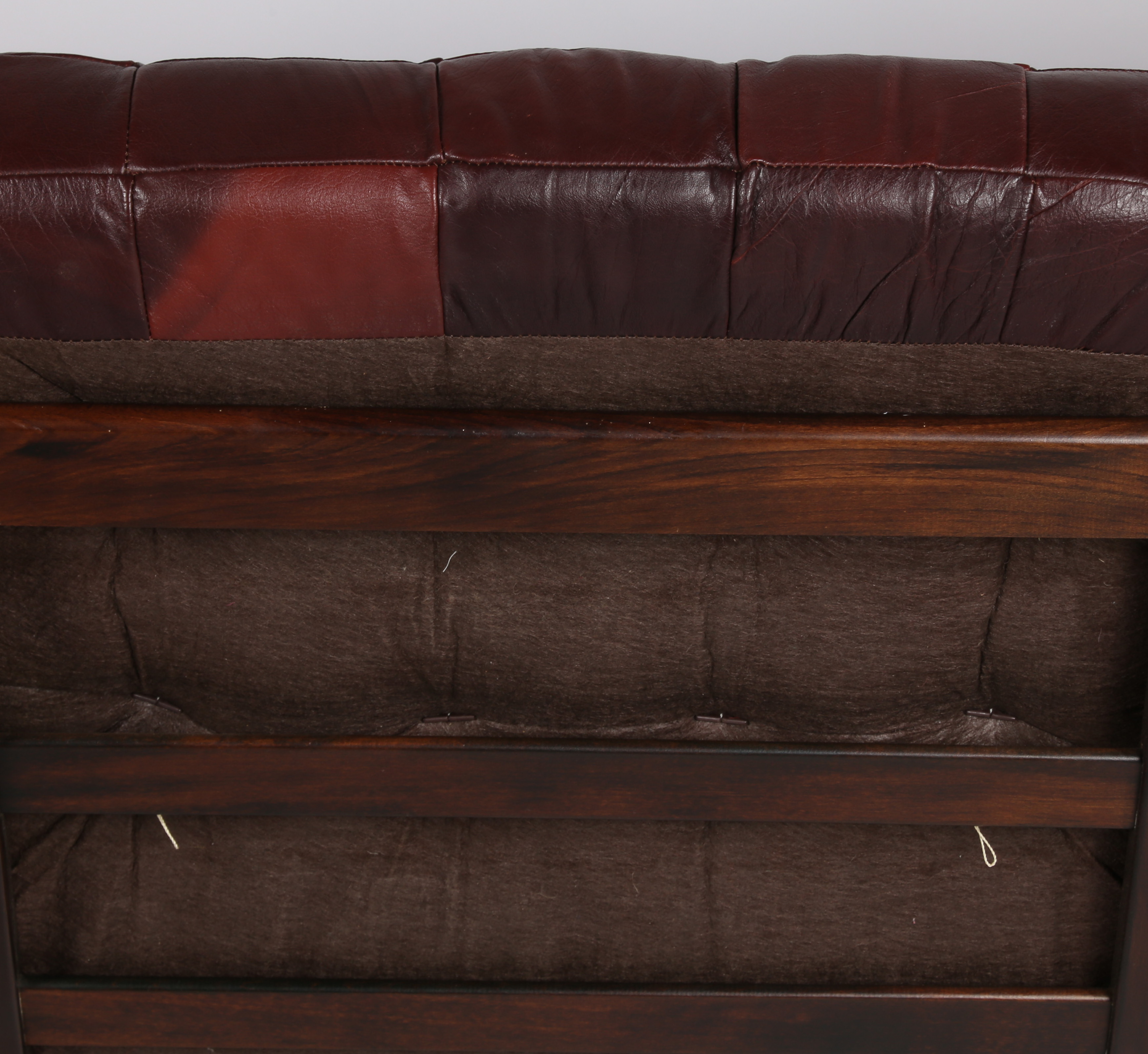 A mid 20th Century Scandinavian leather and bent wood three piece suite, comprising of a three - Image 6 of 10