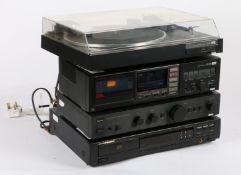 Sansui Turntable (P-D15), Cassette Deck (D-65CR), and Amplifier (AU-G11XII) together with a
