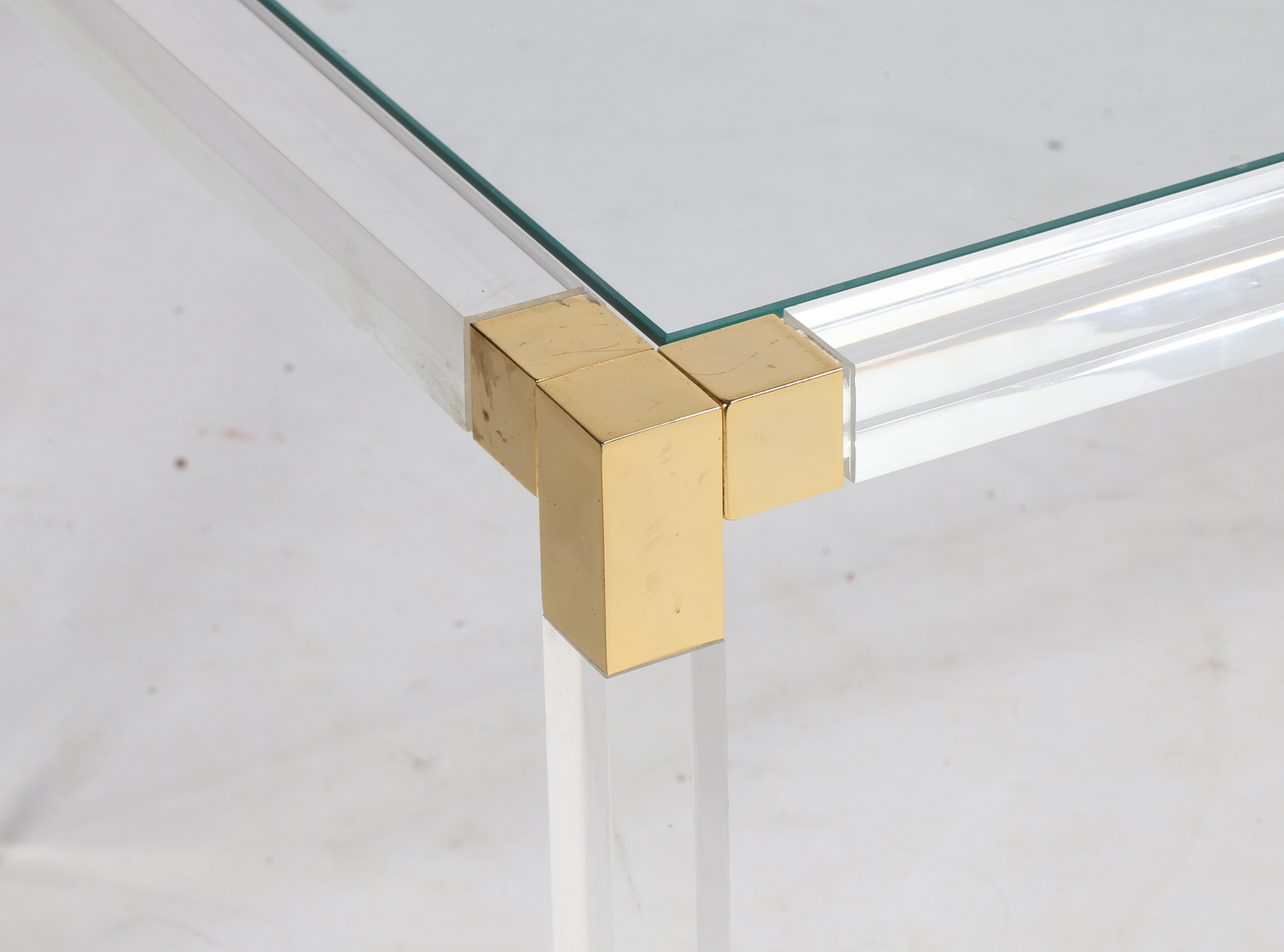 A rectangular coffee table, circa 1970s, the glass top supported on Lucite and gilded metal finished - Image 3 of 4