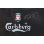 Liverpool F.C. Away/ Third shirt circa 2002/04 autographed by Michael Owen. Framed and glazed,