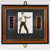 A collection of six framed Elvis Presley film cells