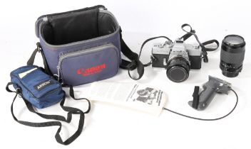 Minolta SRT303b camera body with a Tamron BBAR MULTI C. 1:2.8 lens, a Sigma Zoom-K 1:4-5.6 lens,