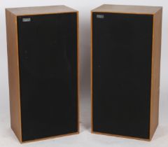 A pair of teak cased Celestion Ditton 44 floor standing speakers, 37cm x 26cm x 77cm.