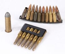 Pre Second World War charger clip of six 6.5mm Carcano rounds by SMI, dated 1936 to base, together