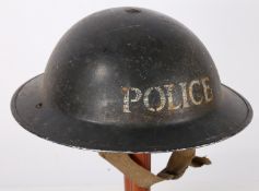 Second World War Police issue Mk II steel helmet, blue paint finish with 'POLICE' stencilled in
