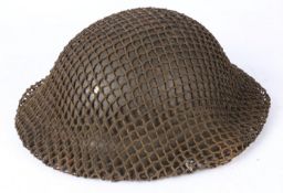Second World War British MK II Steel Helmet, complete with liner, chin strap and camouflage helmet