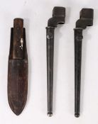 A Second World War British No.4 Mk II Spike Bayonet, held in a Mk I scabbard, together with a