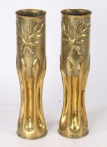 First World War Trench Art, vases in the form of two French 75mm shell cases, fluted and stippled,
