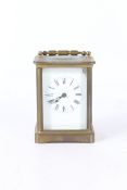 Victorian presentation carriage clock, brass casing, white enamel dial with Roman numerals, engraved