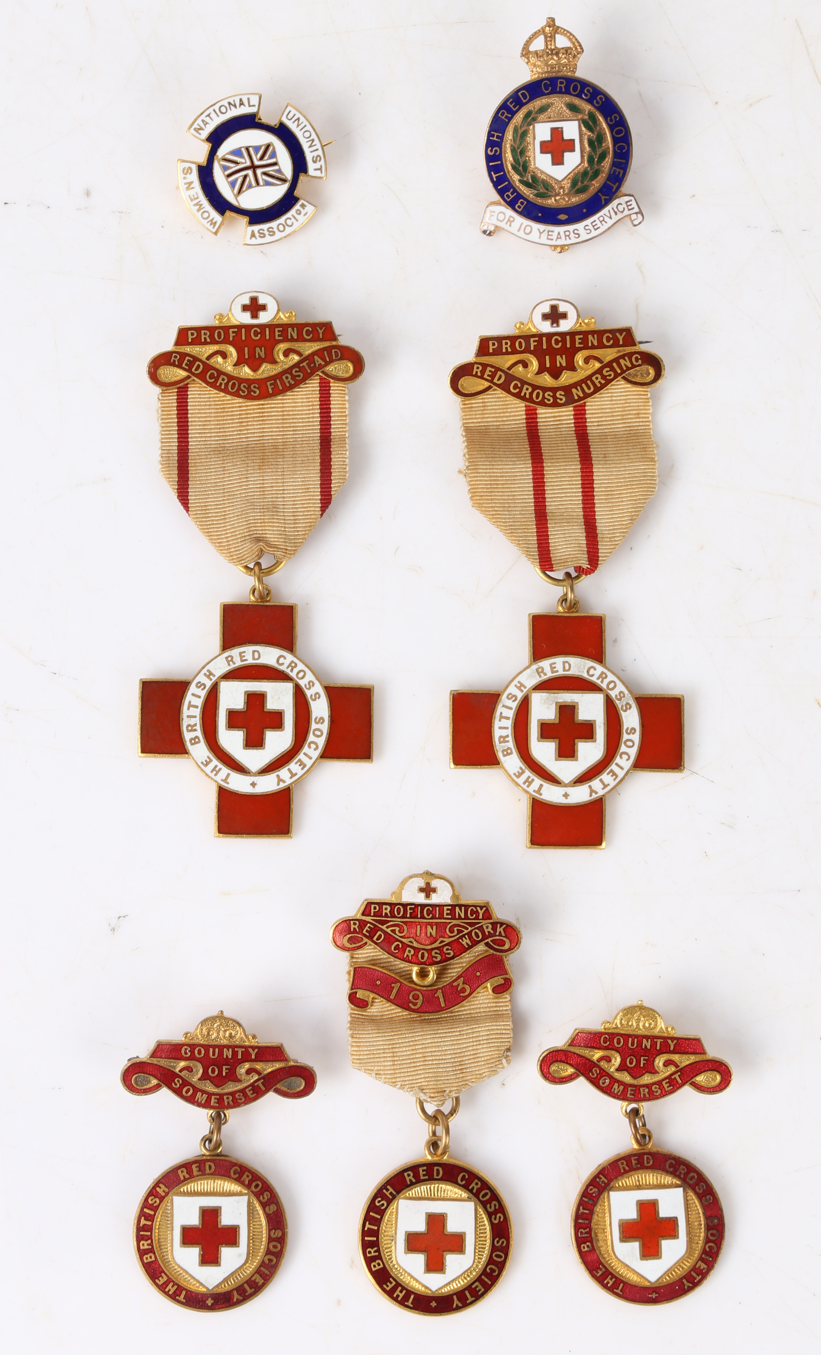Group of attributed British Red Cross medals and badges, Scarce example of the short lived British