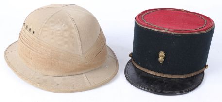 Second World War period 'Bombay Bowler' pith helmet , interior stamped with makers details 'E.W.