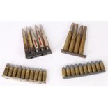 Charger clip of 4 Mannlicher 6.5 rounds, together with a clip of 5 .303 training rounds (brass and