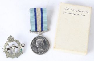 Queen Elizabeth II Royal Observer corps Medal, 1st issue (CHIEF OBSERVER J.E. GARDNER), held in