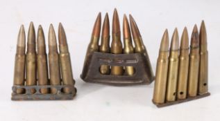 Selection of charger clips with small calibre ammunition, includin U.S. .30-30, and a WW1 French 5