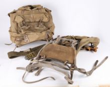 Military Commando type bergen, canvas with metal frame and leather straps, back support strap marked