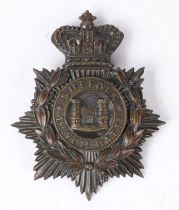 Home Service Helmet plate in bronzed brass to the 1st Volunteer Battalion the Suffolk Regiment,