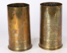First World War Trench art in the form of two British 18 Pdr shell cases engraved with foliate and