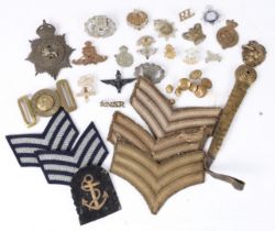Mixed lot of military badges, buttons etc, includingRoyal Artillery, Essex Regiment, Wessex Brigade,