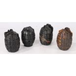 Four First World War British Mills Grenade casings, no safety levers, pins or base plugs, inert, (