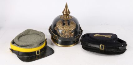 Reproduction Prussian 1895 pattern Pickelhaube, together with two reproduction American civil War