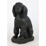 A reconstituted stone figure of a seated spaniel, 49cm high