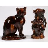 A 19th century treacle glazed cat, and a similar Ralph Wood style toby jug, 27cm tall & 25cm tall (