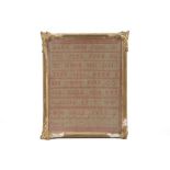 A Victorian needlework monochrome sampler, embroidered with the alphabet, named to Mary, housed in a