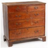 A George III mahogany chest of two short and three long drawers, with brass swan neck handles,