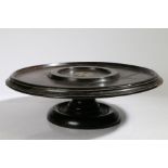 A 20th century oak lazy susan, with circular top and spread foot, 42cm diameter