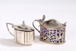 A Victorian silver mustard pot, London 1894, makers marks rubbed the domed lid with pierced shell