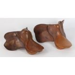 Two brown leather horse saddles (2)