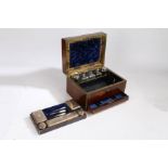 A Victorian rosewood and brass bound vanity box, the hinged lid enclosing a plush lined interior,
