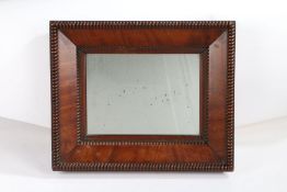 19th century mahogany mirror, in the manner of Gillows, the glass plate within a chamfered and