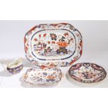 A Bloor Derby imari pattern plate, a first quarter of the 19th century Derby porcelain sauceboat,