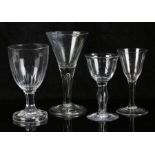 Four 18th Century glasses, to include a rummer with slice cut bowl and octagonal stem and foot, a