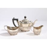 A Victorian silver three piece tea set, Sheffield 1895, maker John Round & Son ltd. consisting of