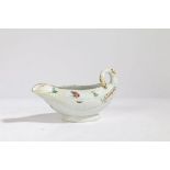 An 18th century Derby porcelain sauce boat, painted with butterflies and flowers, 18cm wide