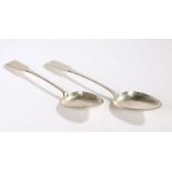 A pair of George III Scottish silver basting spoons, Edinburgh 1810, maker JM, the fiddle pattern