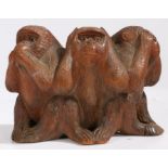 A Chinese carved treen figure group 'Three Wise Monkeys', 20th century, two character marks to base,