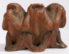 A Chinese carved treen figure group 'Three Wise Monkeys', 20th century, two character marks to base,