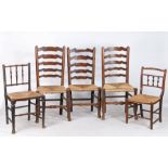 Three 19th Century ladder back dining chairs, Lancashire, with rush seats, on turned legs and