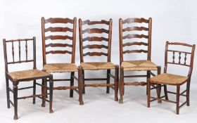 Three 19th Century ladder back dining chairs, Lancashire, with rush seats, on turned legs and