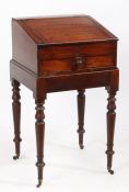 A Victorian mahogany writing box and stand, with sloping hinged lid, the stand with turned legs