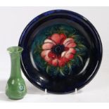 A Moorcroft pottery dish, decorated in the anemone pattern, 22cm diameter, a Moorcroft made for